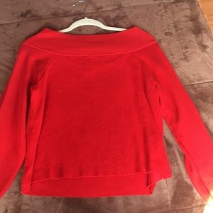Red off-the-shoulder sweater